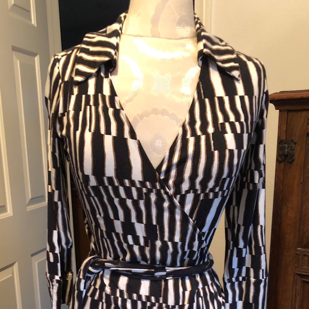 Wrap around blouse. No tears or holes.